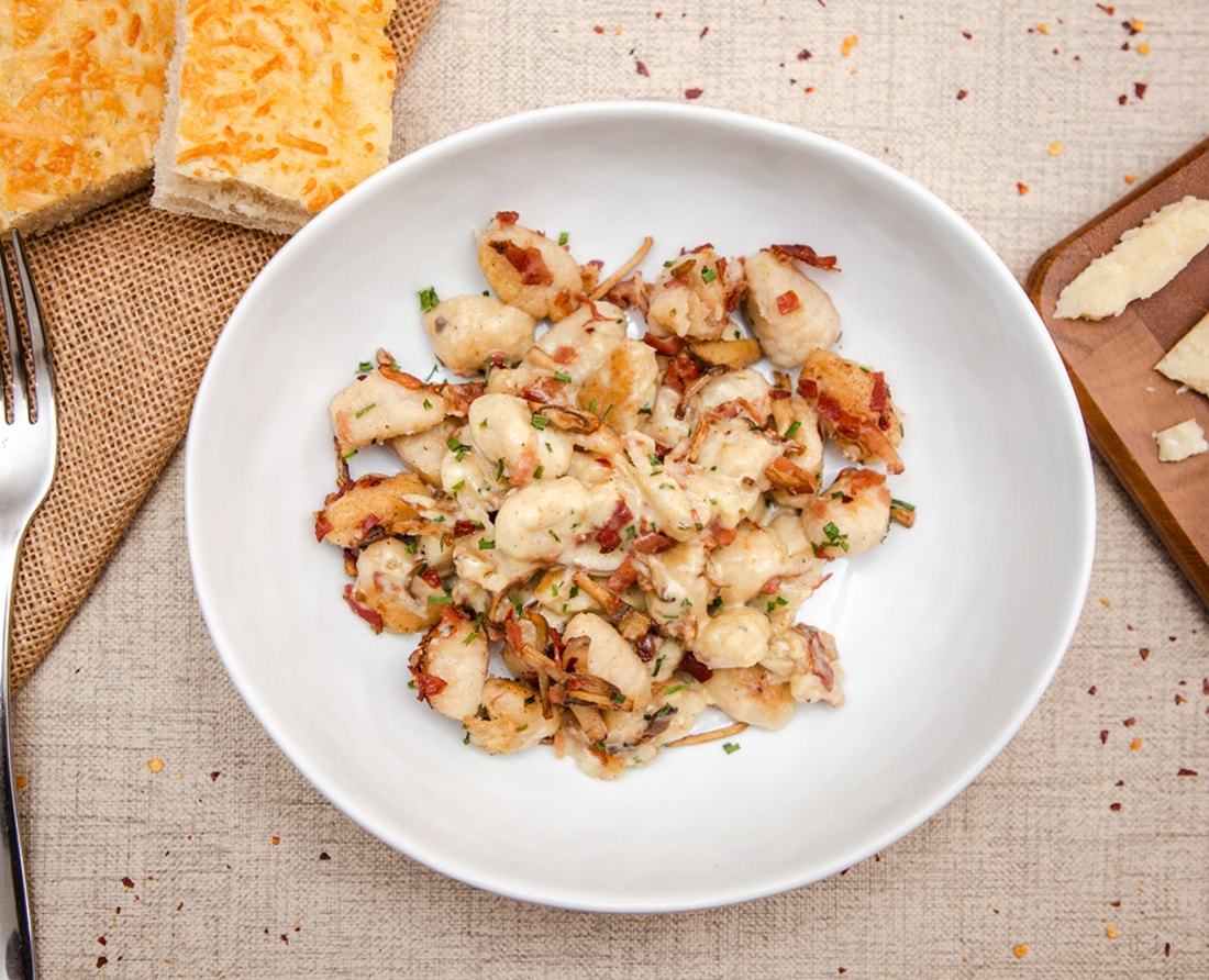 Gnocchi en salsa  3 quesos